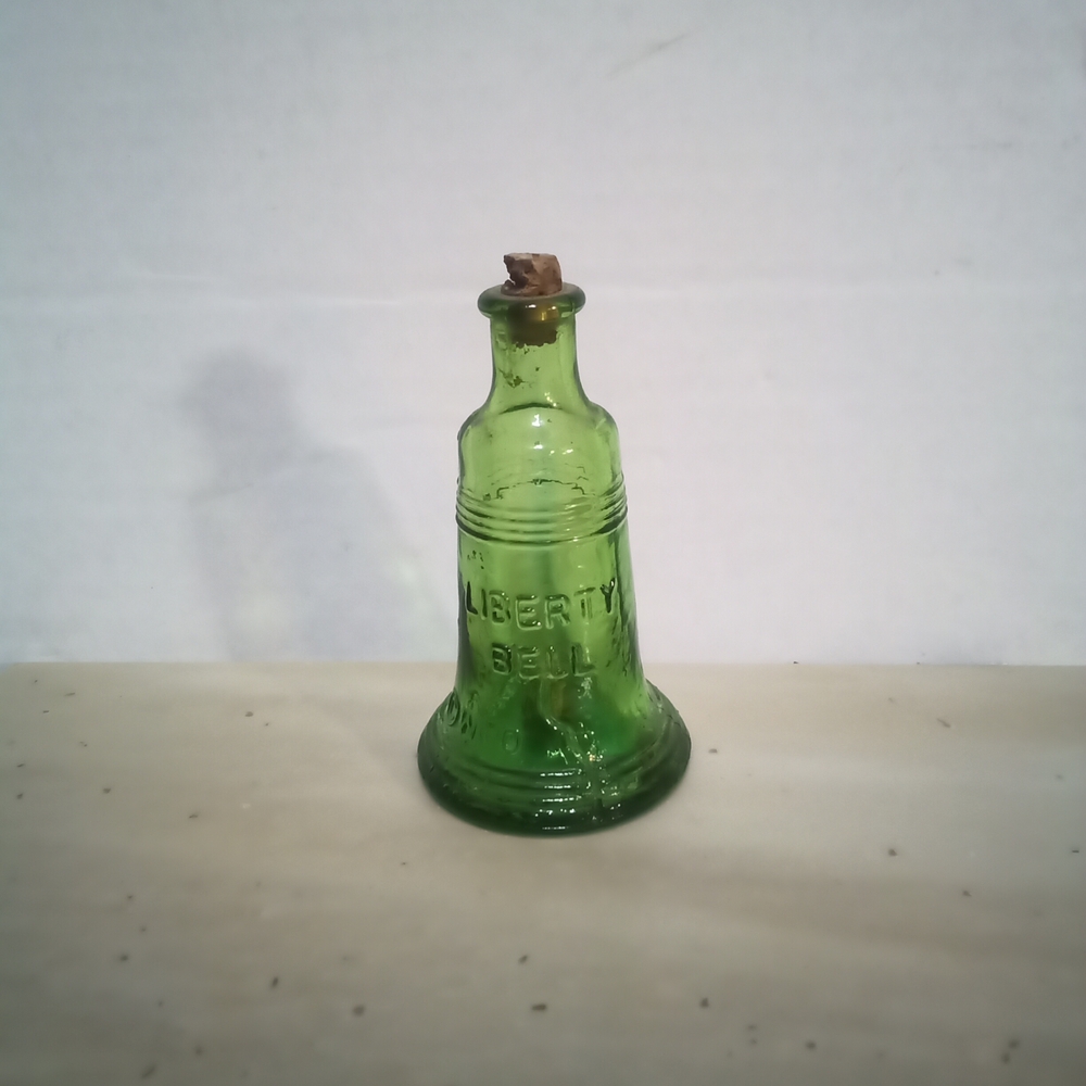 Vibrant Green Bell-Shaped Glass Bottle